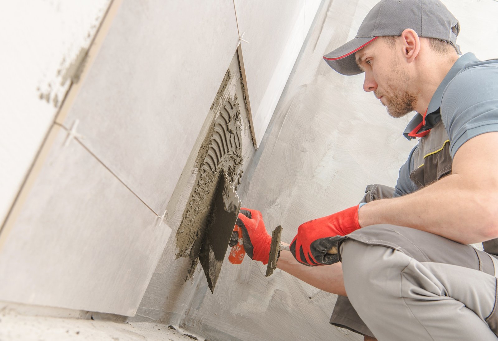 Bathroom ceramic tile installation in a wet service environment