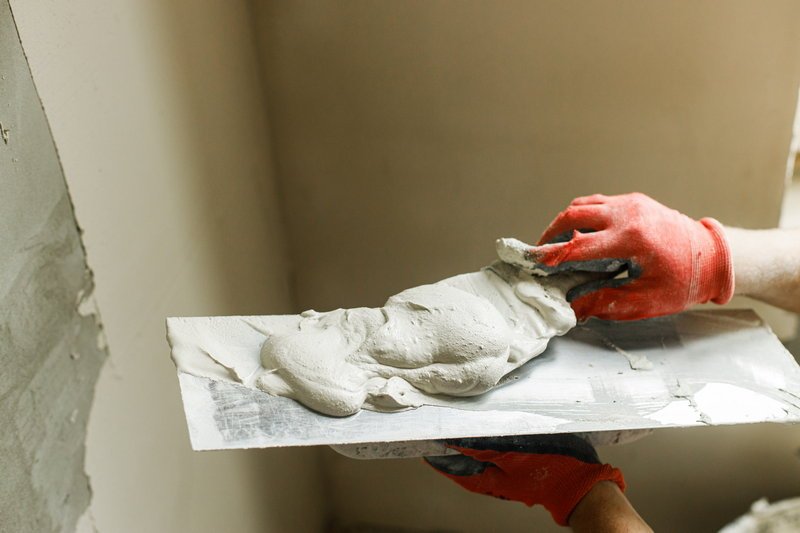 Plaster and render application on a wall